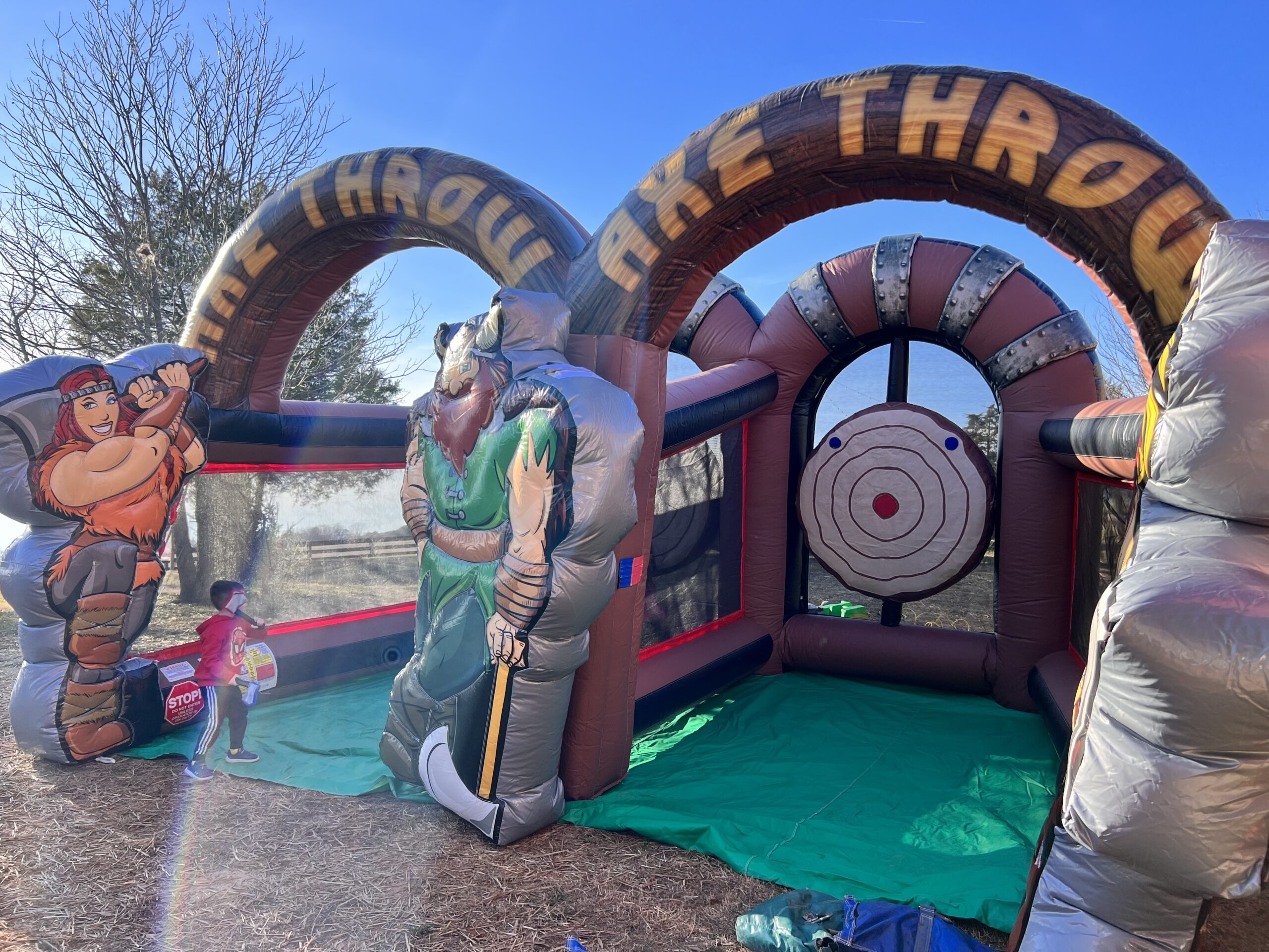 Ax throwing inflatable rental for kid's parties.